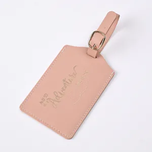 Pink PU leather luggage tag with gold foil text and buckle, perfect for travel identification.