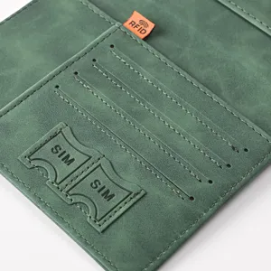 Green PU leather passport holder card case with SIM slots and RFID protection detail.