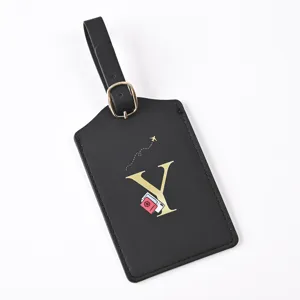 Black PU leather luggage tag featuring a stylish gold letter Y print, perfect for travel.