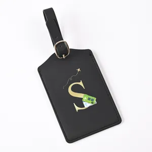 Black leather luggage tag with gold letter S, durable travel suitcase ID label for bags.