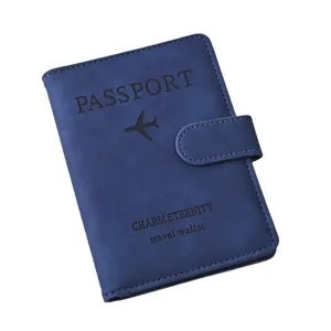 Blue PU leather passport holder travel wallet with secure magnetic snap and minimalist design.