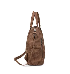 Brown soft leather convertible women backpack shoulder bag side view detail display chic.