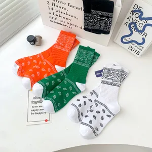 Trendy paisley pattern crew socks, comfortable cotton blend casual sports socks for daily wear.
