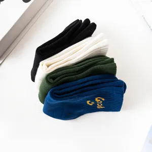 Casual cotton socks set with embroidered good smiley face design for men and women daily wear.