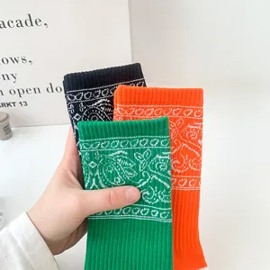 Bandana paisley pattern detail on casual sport long socks, multiple vibrant colors available.
