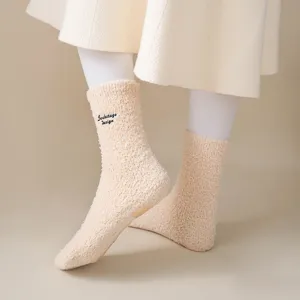Cozy plush slouchy winter socks with delicate letter embroidery for women warm daily wear.