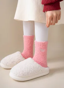Cozy pink plush mid-tube socks for women, warm winter slouchy knit socks with cute embroidery detail.