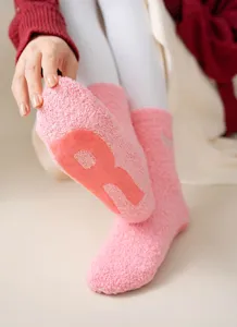Plush fuzzy pink slouch socks for women winter warm cozy mid-tube hosiery with anti-slip sole