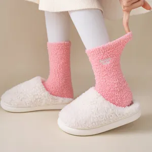 Cozy plush winter slouch socks with letter embroidery and warm fleece material for women