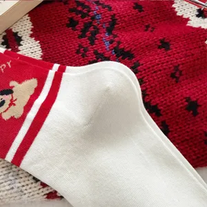 New year red cartoon puppy stripe mid-tube socks, festive cotton socks for winter season.