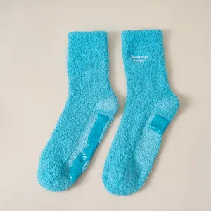 Cozy fuzzy winter non-slip mid-calf socks for women, plush warm solid color casual pile socks.