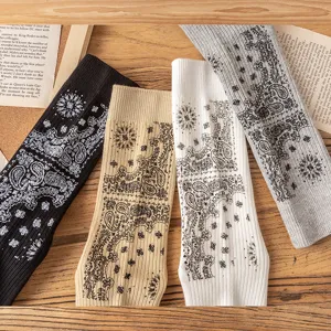 Detailed shot of vintage paisley print crew socks, comfortable cotton knit for daily wear.