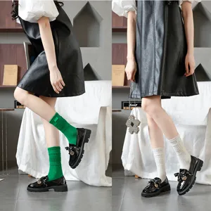 Women's thickened loop long socks with custom leather label, stylish and warm for autumn winter.