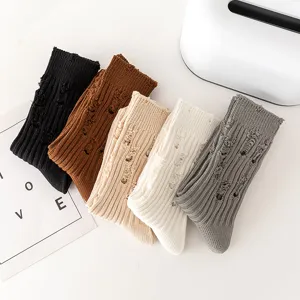 Distressed knit mid-calf socks for men and women, trendy casual crew socks in multi colors.