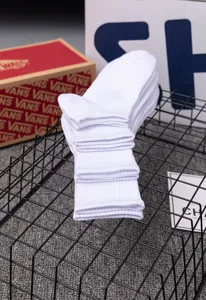 Unisex white cotton mid-tube sports socks, breathable ribbed design for spring and summer.