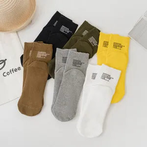 Women men solid color thick needle short cotton socks casual breathable daily wear multiple colors.