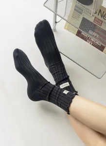 Women's dark grey ribbed ruffle cuff mid-calf socks, stylish autumn winter cotton daily wear.