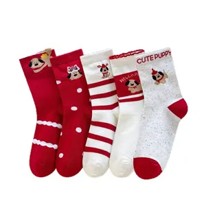 Festive red white cotton mid-tube socks featuring cute cartoon puppy designs for New Year festival.