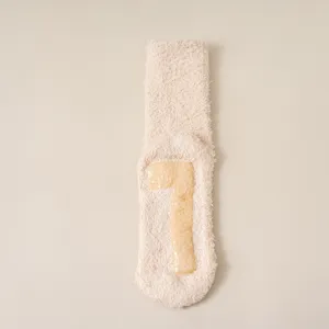 Cozy plush fuzzy crew socks with anti-slip grip, solid color warm winter casual socks detail.