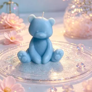 Cute blue sitting bear scented candle detail view, perfect romantic room decor and gift.