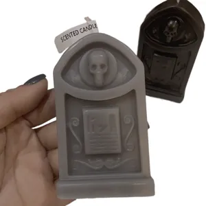 Halloween skull tombstone scented candle, gothic home decor gift, spooky wax ornament.