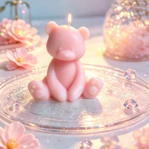 Cute pink bear scented candle with glowing wick, perfect romantic home decor and gift piece.