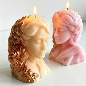 Exquisite handmade soy wax scented candle featuring a meditating female bust with floral details.