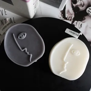 Nordic minimalist abstract face scented candles set, grey and white geometric wax home decor main