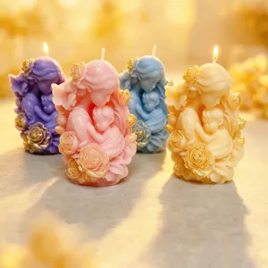 Detailed view of handmade mother and child scented soy wax candles with exquisite rose decor.