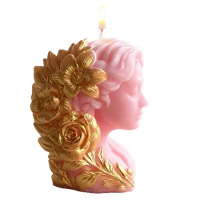 Pink goddess sculpture scented candle with gold floral decor soy wax home decor gift.