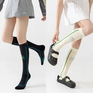 Breathable mesh compression sports socks for women, ideal for running, yoga, and fitness.