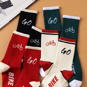 Casual cotton mid-tube socks with bike and letter knit patterns, stylish unisex streetwear.