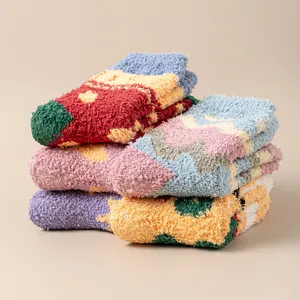 Cozy winter fuzzy socks for women, thick coral fleece non-slip floor socks with warm design.