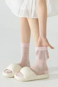 Sheer mesh mid-calf socks detail shot, breathable mulberry silk style fabric for spring.