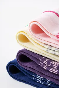 Detailed view of breathable mesh compression athletic socks, soft knit texture and snug fit.