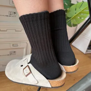 Calcetines de canalé negro clásico a media pantorrilla para hombres y mujeres, algodón transpirable.