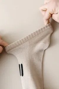 Comfortable casual mesh socks with elastic ribbed cuff, minimalist daily wear style.