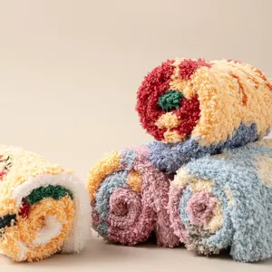 Cozy coral fleece winter sleep socks detail, soft fluffy texture, colorful warm floor design.