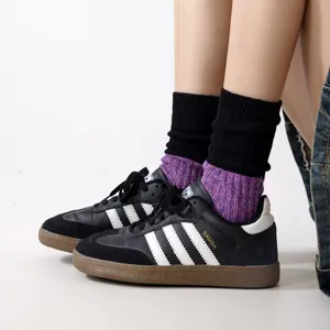 Knitted crew socks with contrasting colors, comfortable and breathable cotton for daily wear.