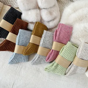 Cozy thick knit wool blend mid-calf socks for women, warm colorful speckled winter casual wear.