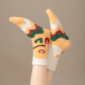 Fluffy coral fleece Christmas socks with cute winter pattern, thick warm sleep floor socks detail.