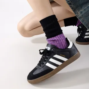 Chunky knit mid-tube socks with vibrant color block design, breathable and stylish unisex daily wear.
