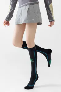 Breathable compression socks for sports and fitness, mesh design for running and yoga wear.
