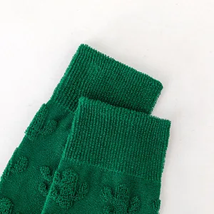 Gemütliche grüne Kuschelsocken mit Struktur, dicke warme Wintersocken für Damen und Herren.