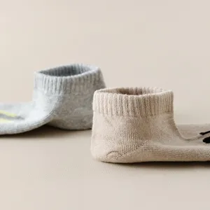 Comfortable soft cotton ankle socks in neutral colors, featuring a clean modern daily design.