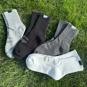 Casual sports crew socks with stylish letter prints, breathable cotton, 4 basic colors.