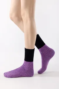 Comfortable knit mid-calf socks with contrast black cuffs and stylish purple heather design.
