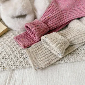 Cozy knit slouch socks for women, thick warm wool blend crew socks with colorful flecks.