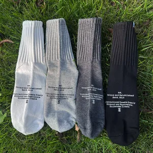 Casual solid color mid-tube cotton socks with unique printed letters for men daily wear.