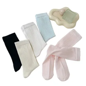 Women solid color vertical stripe breathable mid tube socks set main view flat lay display